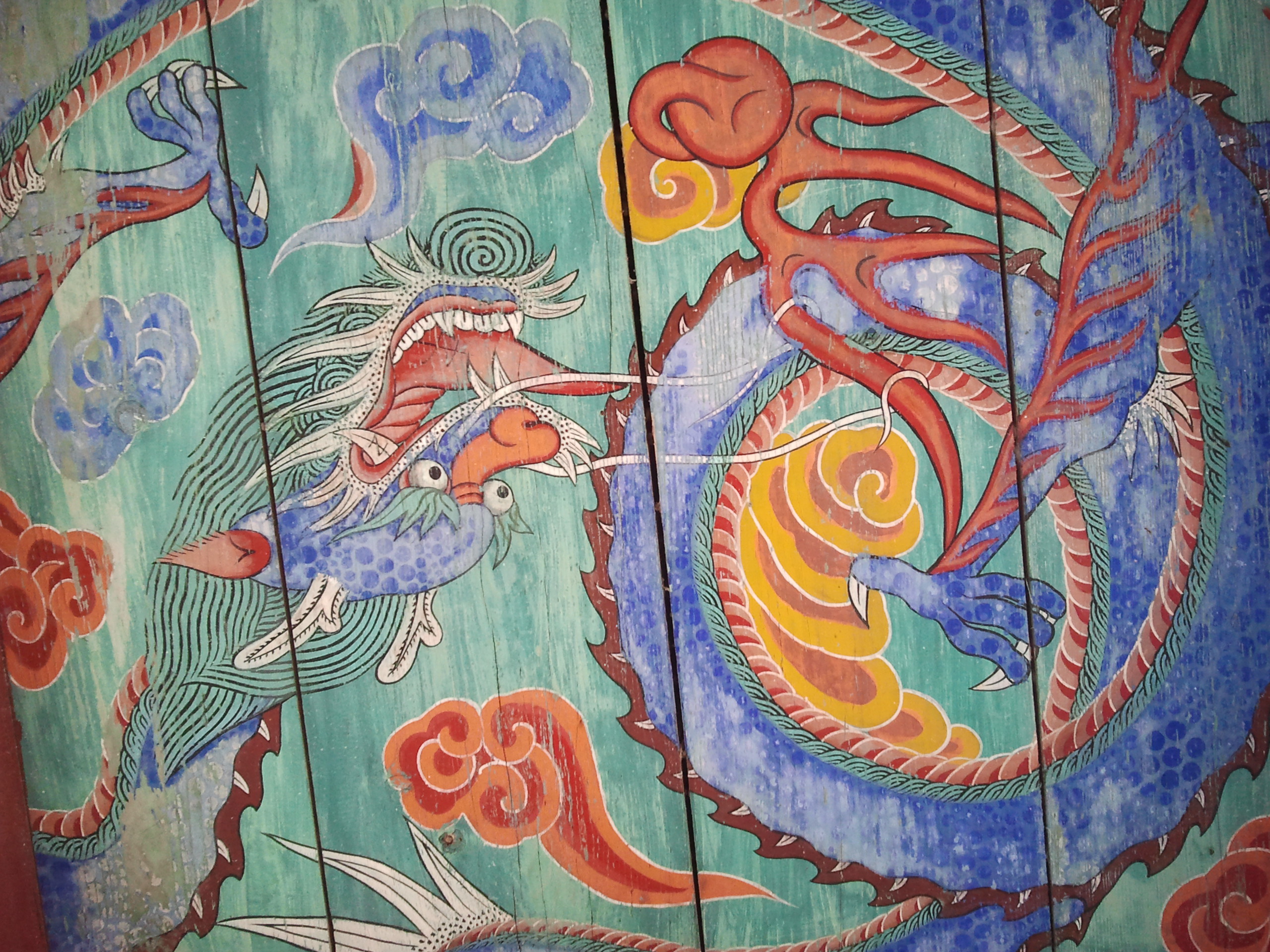 Traditional dragon painting on temple doors